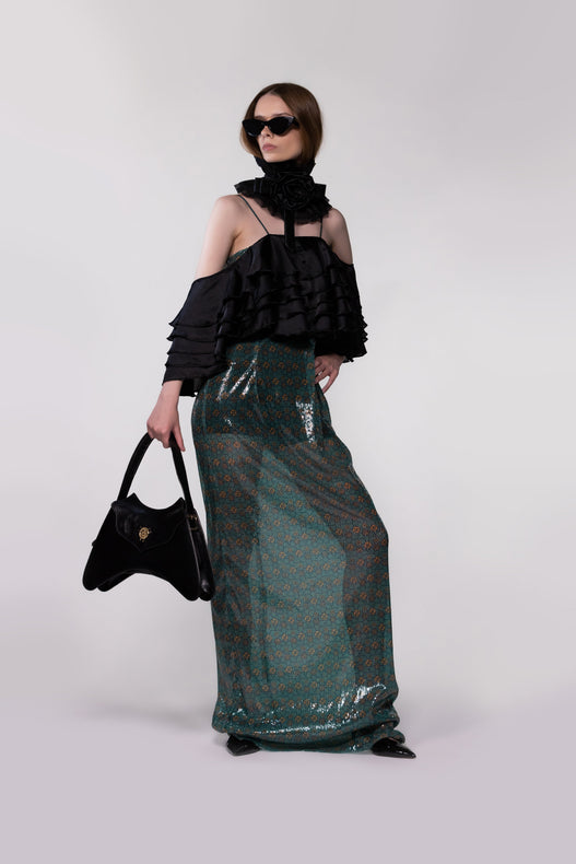 Helen Anthony Monogram Sequin Off-the-Shoulder Evening Gown in exclusive monogram sequin fabric, styled with the Helen Anthony Leather Bag.