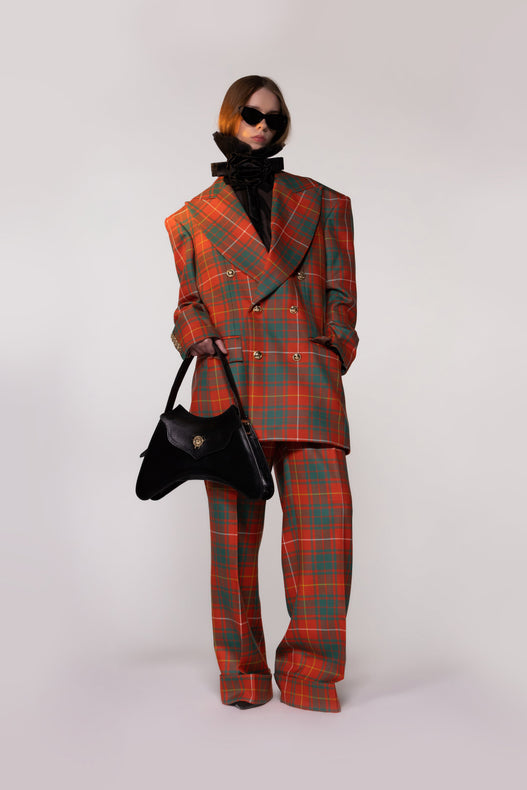 Helen Anthony Heritage Check Double-Breasted Wool Blazer in 100% British wool styled with matching tailored wool trousers and small black leather shoulder bag.