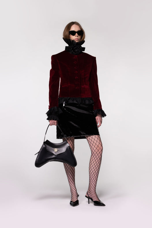 Model wearing the Helen Anthony Velvet Frill Cropped Jacket styled with the Organza Shirt and PU Leather Midi Skirt for an elegant contemporary occasion look.