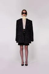 Helen Anthony Hand-Embroidered Sequin Wool Double-Breasted Blazer in 100% British wool styled with an Organza Blouse and PU Leather Midi Skirt.