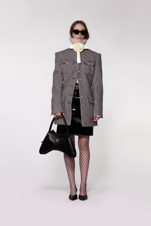 Close-up of the Helen Anthony Houndstooth Round Neck Tailored Wool Jacket in 100% British wool with gold monogram buttons.