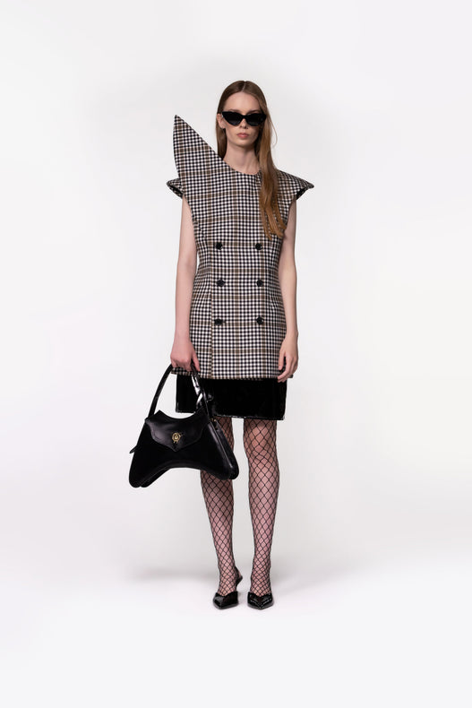 Helen Anthony Check Sculptural Double-Breasted Jacket in 100% British wool styled with the Helen Anthony PU Leather Midi Skirt.